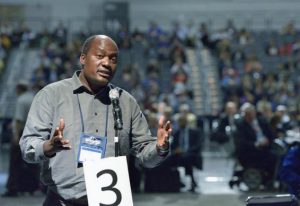 The Rev. Forbes Matonga from the West Zimbabwe annual conference speaks at the UM General Conference in Portland. UMNS photo by Paul Jeffrey. 